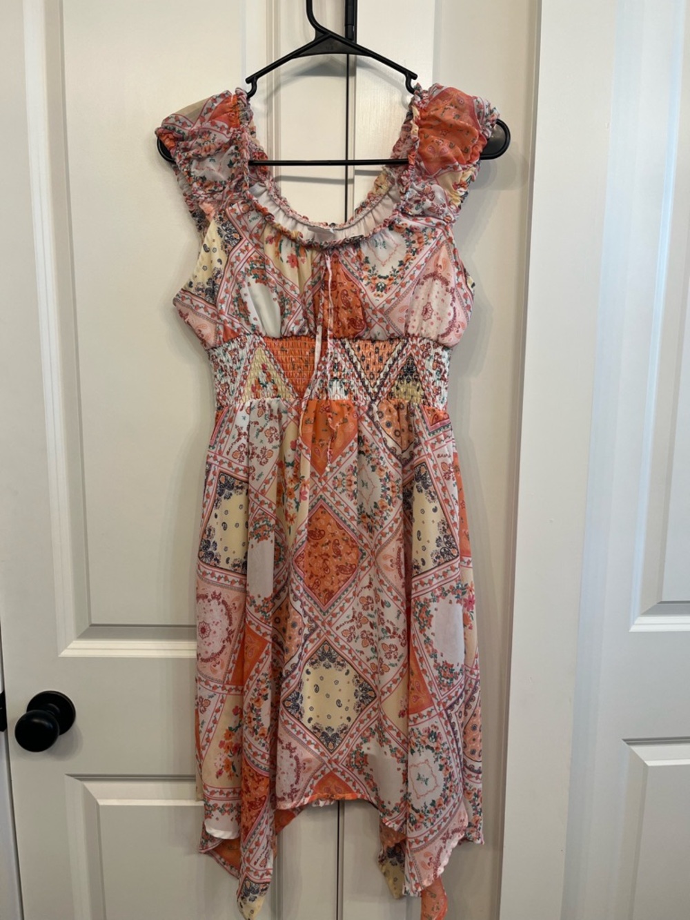 No Boundaries Orange Cream Ruffled Smocked Sundress​